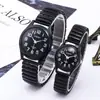 Charon Xapwv Novo Relógio de Casal com Pulseira de Aço e Óleo Branco e Preto Moda Masculina Relógio Feminino Atacado Fornecimento Direto da Fábrica