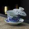 Leia Rui Qianli Jiangshan tigela giratória flutuante de 360 graus porcelana azul e branca tigela de chá três talentos não é quente xícara de chá doméstica tigela
