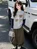 Conjunto de Ropa de Otoño para Niñas 2026 Nuevo Estilo Top de Dos Piezas Falso para Niños Ropa Moderna de Primavera y Otoño para Niñas Mayores