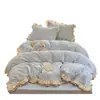 Colección de otoño e invierno: juego de ropa de cama de terciopelo de leche de cuatro piezas, funda de edredón de forro polar coral gruesa por ambos lados y juego de sábanas de franela de tres piezas