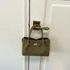 Bolsa Balde Mãe-Filho Portátil de Nicho Feminina 2026 Nova Bolsa de Ombro Transversal Tote Versátil de Alta Qualidade