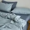 Conjunto de cama azul minimalista japonês feito de algodão puro, cor sólida, conjunto de quatro peças para misturar e combinar, capa de edredom de algodão lavado, conjunto de três peças com lençol de elástico