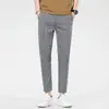 Pantalones casuales de verano para hombre, pantalones elásticos, rectos, deportivos, finos y recortados, de imitación.