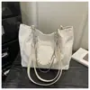 Bolsa Tote de Gran Capacidad Nueva Primavera y Verano 2026 Versátil para el Trabajo Hombro Axila Bolso de Mano con Textura Simple