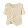Comercio exterior al por mayor verano rosa cuello en V manga corta camiseta diseño femenino nicho cintura plisada abertura irregular top