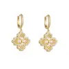 Exquisitos aretes calados de zirconia y perla, un accesorio ligero y de moda para mujer, versátiles y fáciles de combinar, con diseño de pétalo, y que ofrecen un look único y elegante.