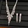 Aretes y collar de borla de circón chapados en oro real de 14 quilates, cadena para clavícula de nicho de lujo ligero, juego de joyería exquisito estilo palacio