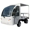 Carro Plano Eléctrico Carretilla de Cuatro Ruedas Dolly Zona de Fábrica Carro de Arrastre de Carga de Rotación Vehículo de Descarga Automática Remolque de Tractor Carga Rey