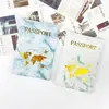 En stock Protector de pasaporte de cuero PU marmoleado transfronterizo Set Portapasaporte con borde cosido a máquina Bolso de cuero para pasaporte