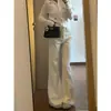 Jeans acampanados de cintura alta color blanco beige para mujer, estilo nuevo delgado de verano 2026, pantalones de campana adelgazantes y no ajustados
