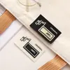 Nuevo en stock Etiqueta de Cuero Edición Gruesa Letras Inglesas Impresas Ropa Pantalones Bolsa Bufanda Sombrero Accesorios de Decoración Marca Registrada Personalizada