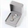Caja de embalaje caja de aretes caja de collar caja de pulsera caja de anillos bolsa de mano paño para limpiar plata agua para limpiar plata una generación de 001