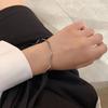 Pulsera abierta con diseño de viento frío y sencillo de minoría japonesa y coreana con anillo de grano de onda roja de Joker Net, venta al por mayor