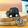 Aleación Tirar Hacia Atrás Coche Colgante Llavero Accesorios Juguete Estudiante Colgante Llavero Coche Regalo Pequeño Venta al por Mayor