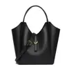 Bolso de mano de comercio exterior, piel genuina, gran capacidad, bolso tote para el trabajo, negro, versátil para uso diario, bolso tipo cubo transfronterizo, venta al por mayor personalizada