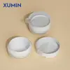 Xu Min en stock Botella de Crema Exfoliante de 150G con Cuchara Pinzas de 50G Botella de Crema para Ojos Sub-empaque de Cosméticos