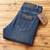 Otoño e Invierno nuevos pantalones largos rectos de algodón elástico para hombre, jeans de sarga suave lavada versátil de alta gama
