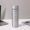 Nova caneca de chá isolada com revestimento de titânio, com separador de chá, grande capacidade, vácuo de camada dupla, design de flor de gelo, caneca para presente, atacado