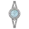 O relógio feminino redondo de quartzo mais vendido da Gedi com pulseira cravejada de diamantes, à prova d'água, estiloso e versátil, relógio de pulso feminino de nicho para o dia a dia.