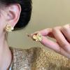 Pendientes de piedra de ojo de gato con flores de metal europeas y americanas para mujer 2025, nuevos pendientes de moda vintage, pendientes de atmósfera de gran sentido
