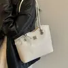 Bolso de hombro con lazo estilo coreano 2026 transfronterizo para mujer, bolso de axila de nicho, bolso tipo cubo moderno y simple para el trabajo diario para mujer