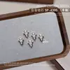 Joyería para Uñas Starburst Aleación Circonita Montón Diamante Alas Colgante Estrella Cuatro Picos Diamante Accesorios Decoraciones para Uñas