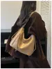 Bolsa de Gran Capacidad Transfronteriza para Mujer 2026 Nuevo Verano Nicho Hombro Único Cruzada Bolso Dumpling Mochila para Viaje