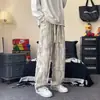 Calça masculina da moda com estampas all-over, estilo high-street, legal e estilosa, inspirada no Instagram, forrada com fleece, calça longa casual, calça larga solta, marca da moda para homens