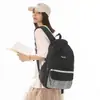 Mochila listrada transfronteiriça de alta aparência para alunos do ensino fundamental II e médio, mochila feminina de nicho simples e estilosa de grande capacidade