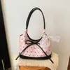 Bolso de hombro de gran capacidad, nicho, versátil, elegante, con estampado de lazo patchwork de color contrastante, nuevo de moda verano 2026