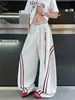 Pantalones deportivos a rayas de pierna ancha estilo americano para hombre, nueva marca de moda 2026, pantalones largos holgados elegantes y casuales para hombre