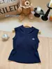 9808 # Estilo de verano nuevo estilo estilo chica popular top sin mangas con capucha y cuello en V retazos corte ajustado top corto de una pieza para mujer con copas en el pecho