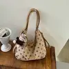 Bolso de mano/hombro para mujer con diseño de moda estilo coreano de lunares para la axila, nuevo modelo de verano 2026, bolso único y dulce