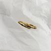 Anel de aço titânio banhado a ouro 18K moda unissex face lapidada diamante anel de amantes tendência ins anel de nicho atacado