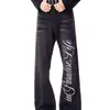 Jeans curvos estampados con patrón de rayo lavado retro americano para hombre, pantalones adelgazantes con vibra de alta costura, jeans de pierna recta acampanados