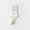 Calcetines de algodón para mujer de otoño e invierno de 168 pines con letras N cara sonriente calcetines para mujer desodorantes absorbentes de sudor calcetines cortos suelas elásticas de moda