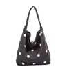 Bolso Cubo de Lunares Super Caliente Gran Capacidad para Mujer Otoño 2026 Nuevo Bolso de Hombro Único Moda Viaje Cotidiano Sensación de Alta Gama