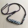 Collar colgante de cuentas Sky de nueve ojos en blanco y negro estilo Xizang, diente amarillo, cuentas Sky, cadena de clavícula tejida a mano, estilo étnico vintage