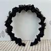 Exquisita y elegante banda para el cabello negra para mujer, nueva moda 2024, estilo extranjero, ligera, de lujo, banda para la cabeza alta con forma de cráneo, tocado con tarjeta dentada
