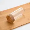 Tapa de Madera de Bambú Manchada Frasco de Vidrio Sellado Botella para Miel Botella de Vidrio Botella para Medicamentos Fabricante Venta al por Mayor Botella de Vidrio Transparente con Tapa
