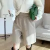 Shorts de lã soltos elegantes de cintura alta elástica design de inverno feminino peça de outer wear calça casual de perna larga em A para botas