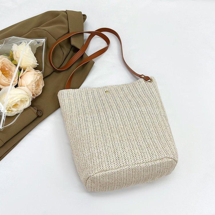 编织包女包新款潮2024夏草编简约百搭小清新水桶包个性单肩斜