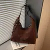Bolso de mano transfronterizo de gamuza para mujer, nueva colección de otoño 2026, bolso tote vintage para el día a día, exquisito bolso tipo dumpling de un solo hombro