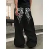 Pantalones casuales retro estampados de comercio exterior transfronterizo para hombres y mujeres, corte holgado, con caída, pierna ancha, versátiles, largos, para todas las estaciones, venta al por mayor desde el fabricante