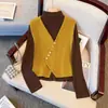 Chaleco de punto de ochos diagonales estilo francés 2025 otoño e invierno versátil elegante cuello en V chaleco suéter chaqueta para mujer