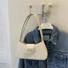 Bolso de axila discreto estilo francés, nueva colección 2026, bolso de mano minimalista, bolso de hombro de moda, bolso cruzado, bolso pequeño para mujer