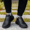 Zapatos casuales de cuero para hombre talla grande 48 para otoño e invierno con cierre de velcro, resistentes a la suciedad, para exportación y AliExpress, zapatos deportivos cómodos y ligeros para hombre