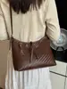 Bolso de hombro para debajo del brazo de moda transfronterizo 2026, bolso de mano tejido de gran capacidad, bolso cruzado tipo cubo