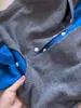 Cárdigan de punto con capucha gris estilo francés de dos piezas falsas para mujer, prenda exterior de principios de otoño con un toque de alta gama, abrigo holgado suave y mullido
