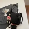 Bolso Cubo Elegante y de Moda de Shuai Mi para Mujer, Nuevo Modelo 2026, Bolso de Hombro Sencillo para el Trabajo, Bolso Cruzado de Hombro de Alto Valor